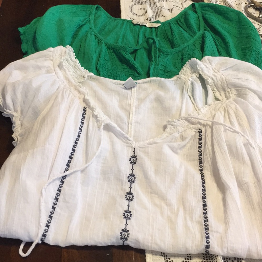 Two peasant blouses with embroidery..